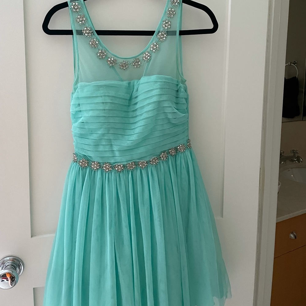 Teal mini dress with jewel accents